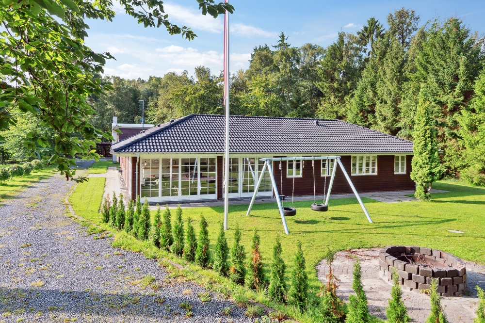 Dette lekre huset med svømmebasseng, nr. 414, med plass til 22 personer, ligger i Nordsjælland