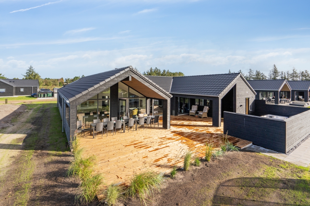 Dette lekre huset med svømmebasseng, nr. 599, med plass til 16 personer, ligger i Sydjylland