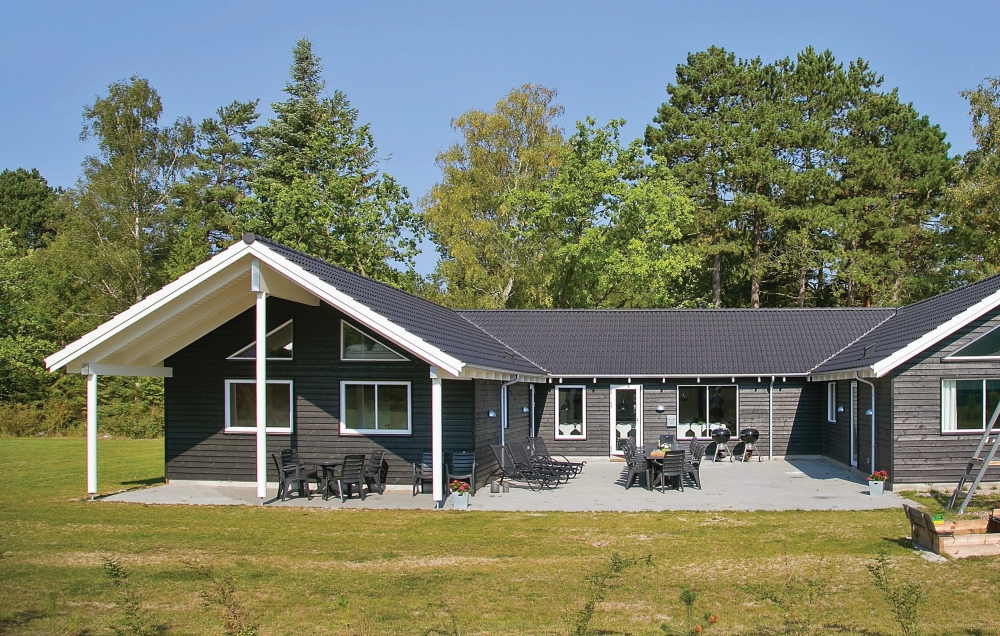 Dette lekre huset med svømmebasseng, nr. 351, med plass til 22 personer, ligger i Nordsjælland