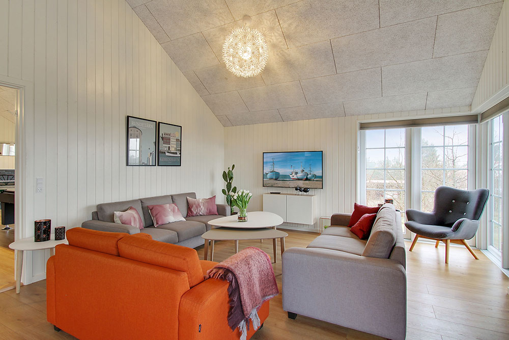 Oppholdsrom med plass til 18 i luksushus nr. 386.