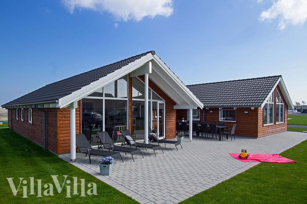 Dette lekre huset med svømmebasseng, nr. 702, med plass til 12 personer, ligger i Tyskland