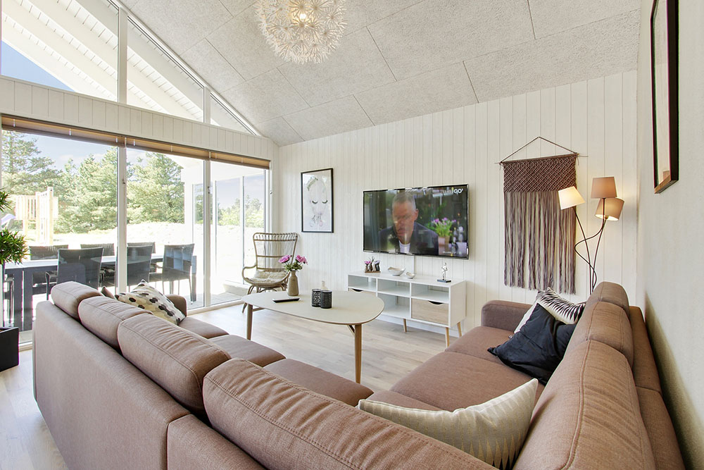 Oppholdsrom med plass til 16 i luksushus nr. 396.