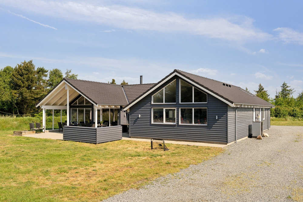 Dette lekre huset med svømmebasseng, nr. 396, med plass til 16 personer, ligger i Vestjylland