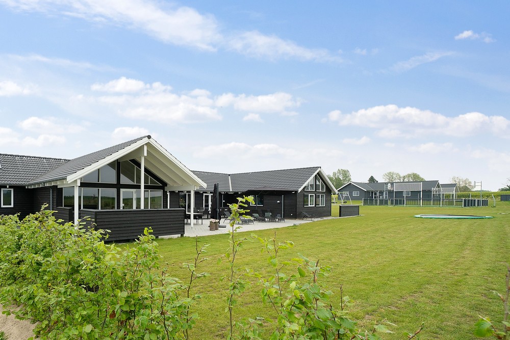 Dette lekre huset med svømmebasseng, nr. 430, med plass til 30 personer, ligger i Fyn og øyer