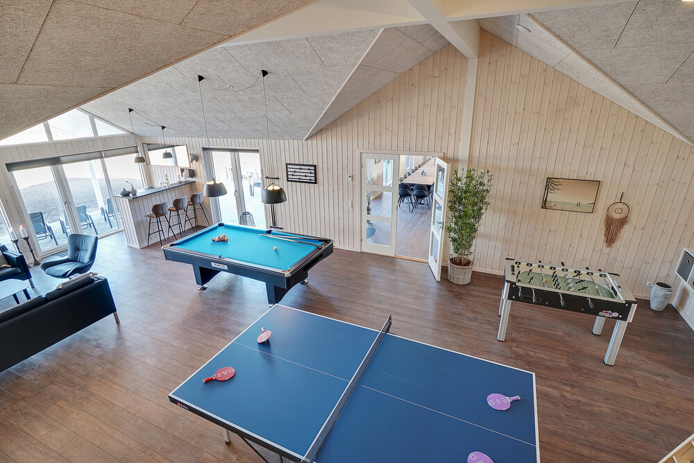 I tillegg til alle aktivitetsmulighetene i husets bassengavdeling, kan du også spille biljard, bordtennis og dart i luksushus nr. 450