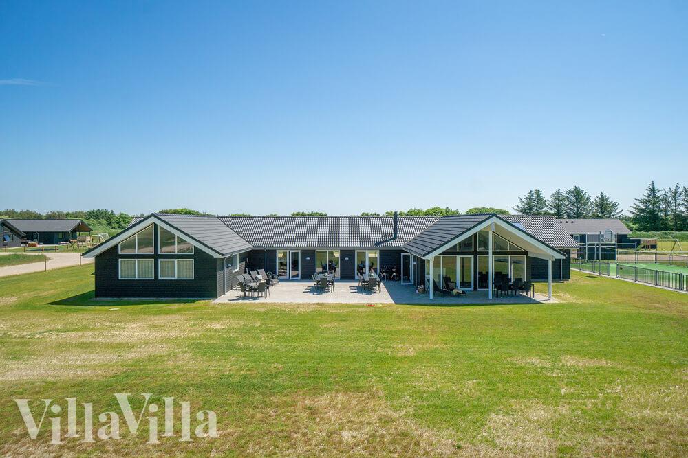 Dette lekre huset med svømmebasseng, nr. 467, med plass til 30 personer, ligger i Vestjylland