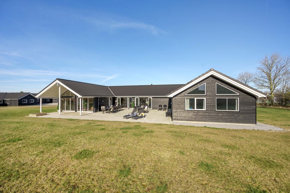 Dette lekre huset med svømmebasseng, nr. 479, med plass til 26 personer, ligger i Østjylland