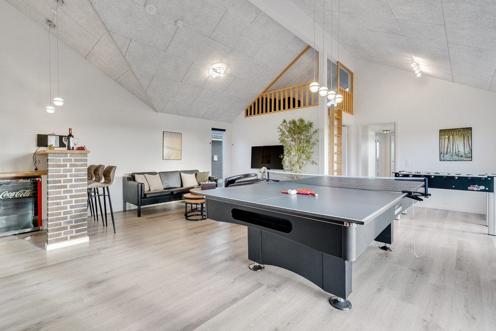 I tillegg til alle aktivitetsmulighetene i husets bassengavdeling, kan du også spille biljard, bordtennis og dart i luksushus nr. 486