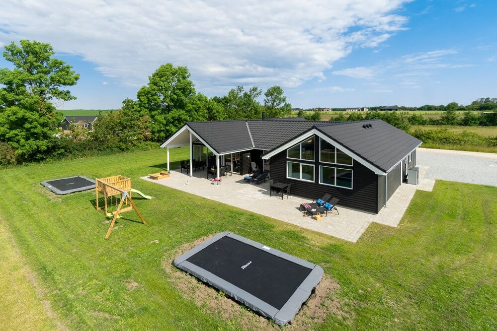 Dette lekre huset med svømmebasseng, nr. 492, med plass til 18 personer, ligger i Østjylland