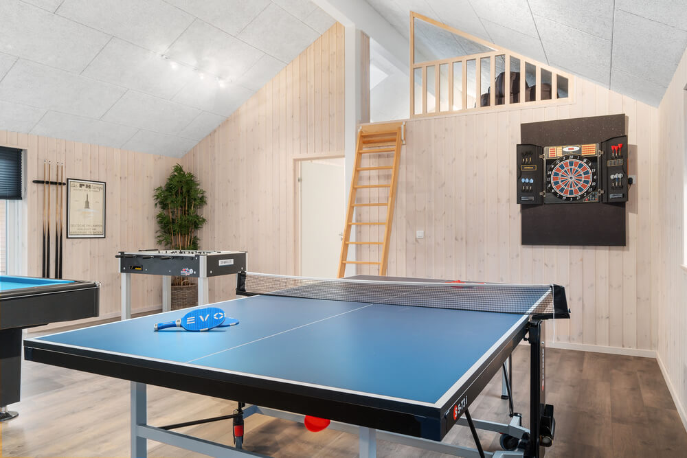 I tillegg til alle aktivitetsmulighetene i husets bassengavdeling, kan du også spille biljard, bordtennis og dart i luksushus nr. 727