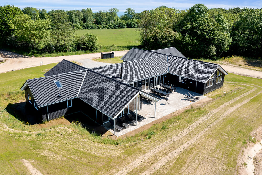 Dette lekre huset med svømmebasseng, nr. 491, med plass til 30 personer, ligger i Sydjylland