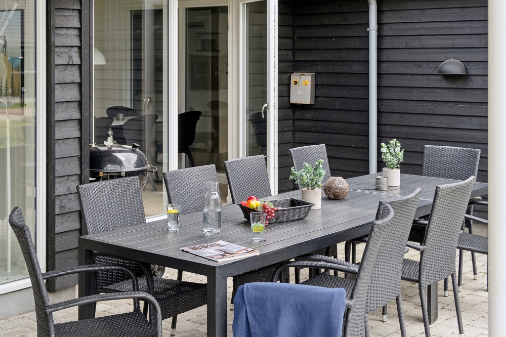 Nyt en grillkveld på terrassen i luksushus nr. 509 i Lolland/Falster/Møn
