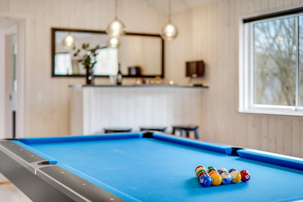 I tillegg til alle aktivitetsmulighetene i husets bassengavdeling, kan du også spille biljard, bordtennis og dart i luksushus nr. 527
