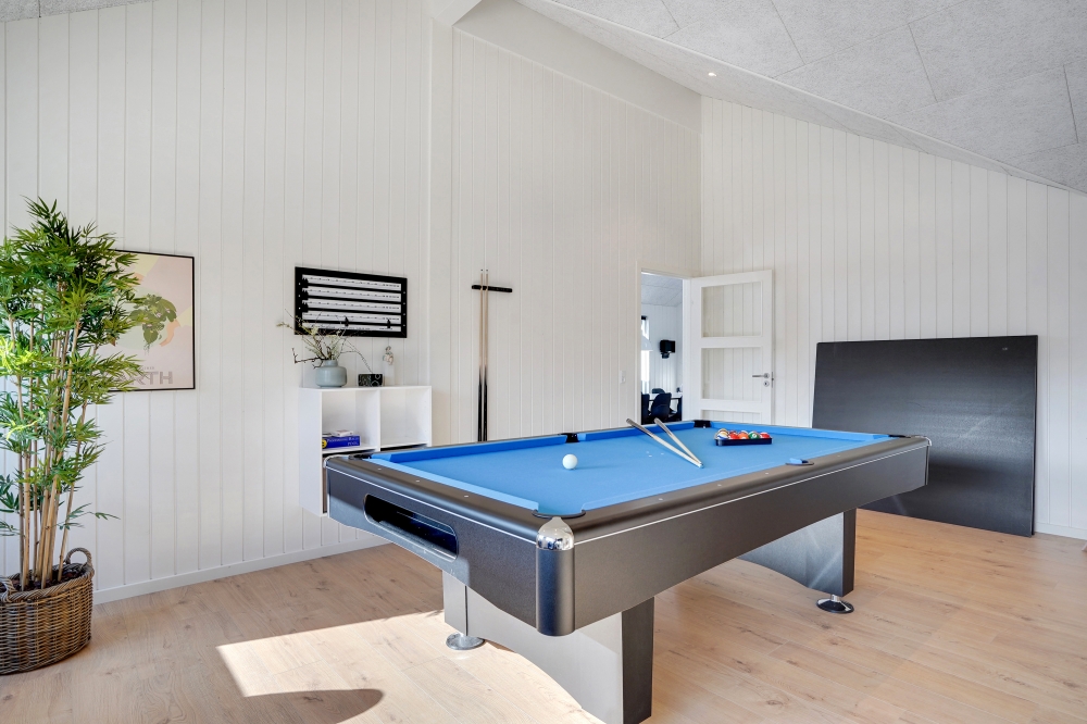 I tillegg til alle aktivitetsmulighetene i husets bassengavdeling, kan du også spille biljard, bordtennis og dart i luksushus nr. 533