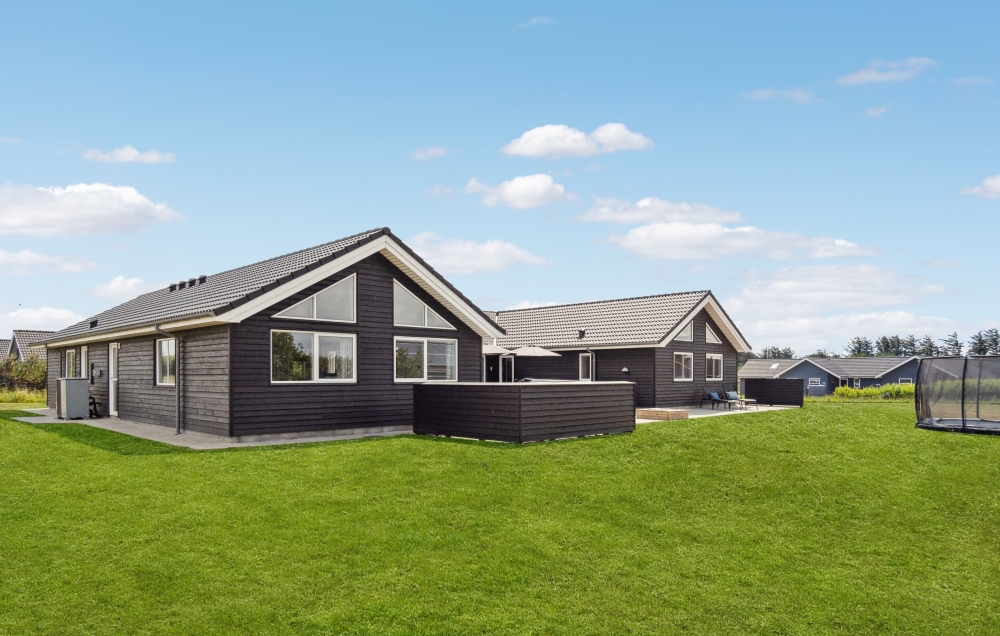 Dette lekre huset med svømmebasseng, nr. 529, med plass til 20 personer, ligger i Nordjylland