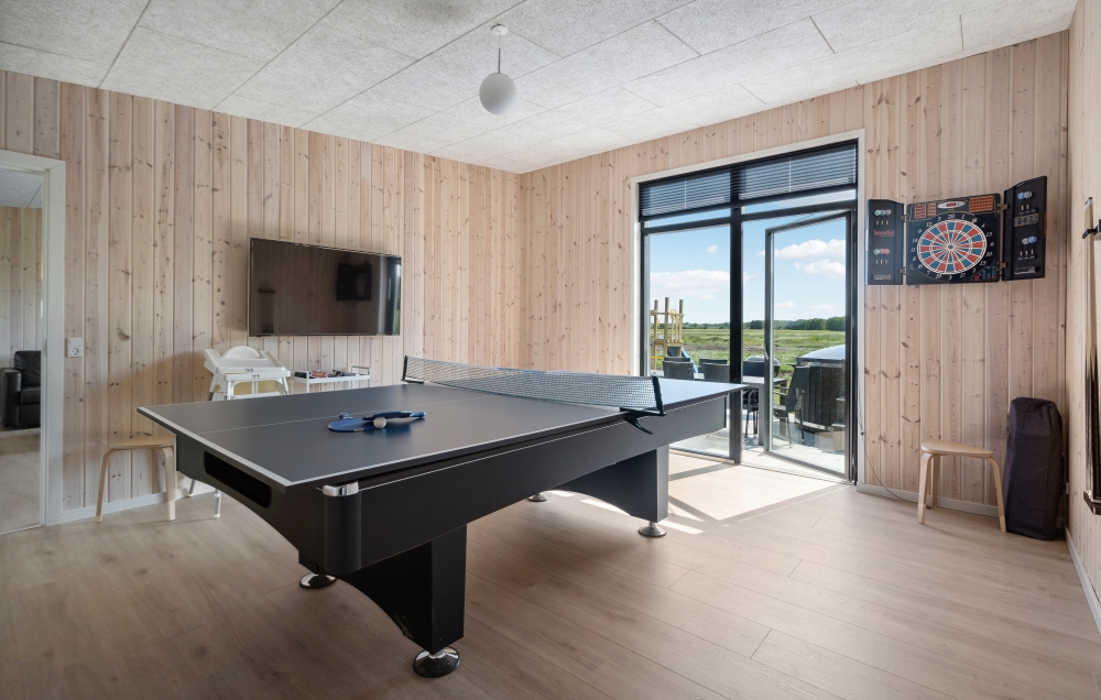 I tillegg til alle aktivitetsmulighetene i husets bassengavdeling, kan du også spille biljard, bordtennis og dart i luksushus nr. 604
