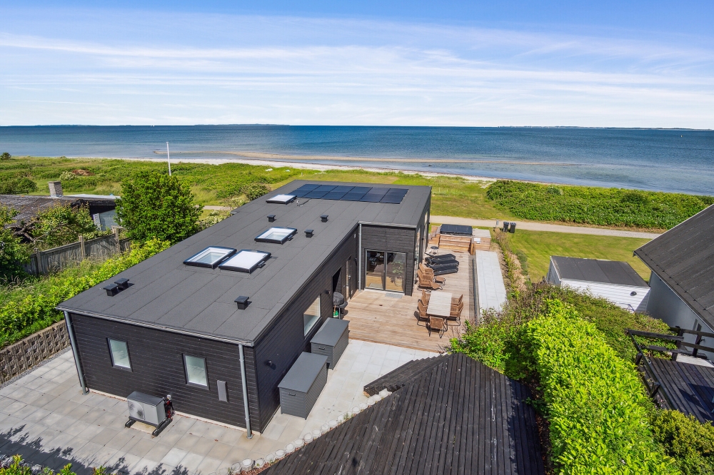 Dette lekre huset med spa, nr. 606, med plass til 6 personer, ligger i Østjylland