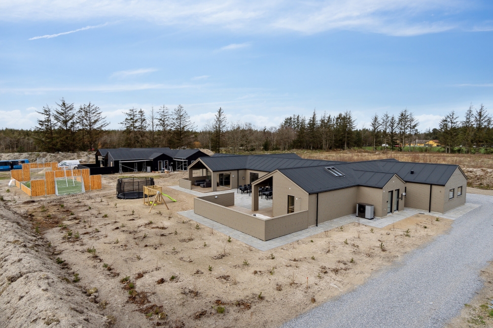 Dette lekre huset med svømmebasseng, nr. 619, med plass til 30 personer, ligger i Nordjylland