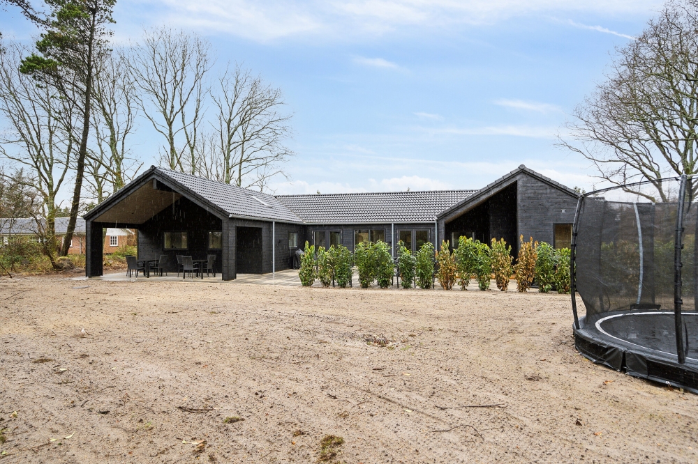 Dette lekre huset med svømmebasseng, nr. 627, med plass til 20 personer, ligger i Vestjylland