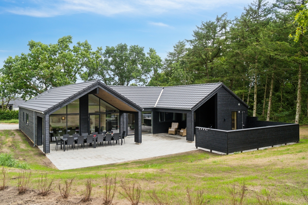 Dette lekre huset med svømmebasseng, nr. 640, med plass til 14 personer, ligger i Østjylland