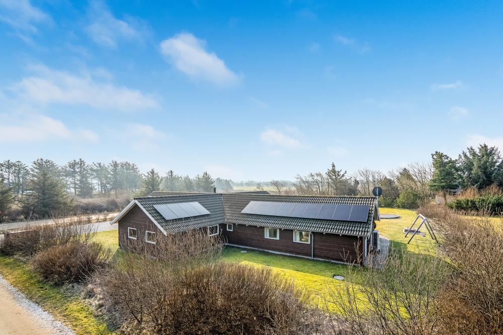 Dette lekre huset med svømmebasseng, nr. 236, med plass til 14 personer, ligger i Nordjylland