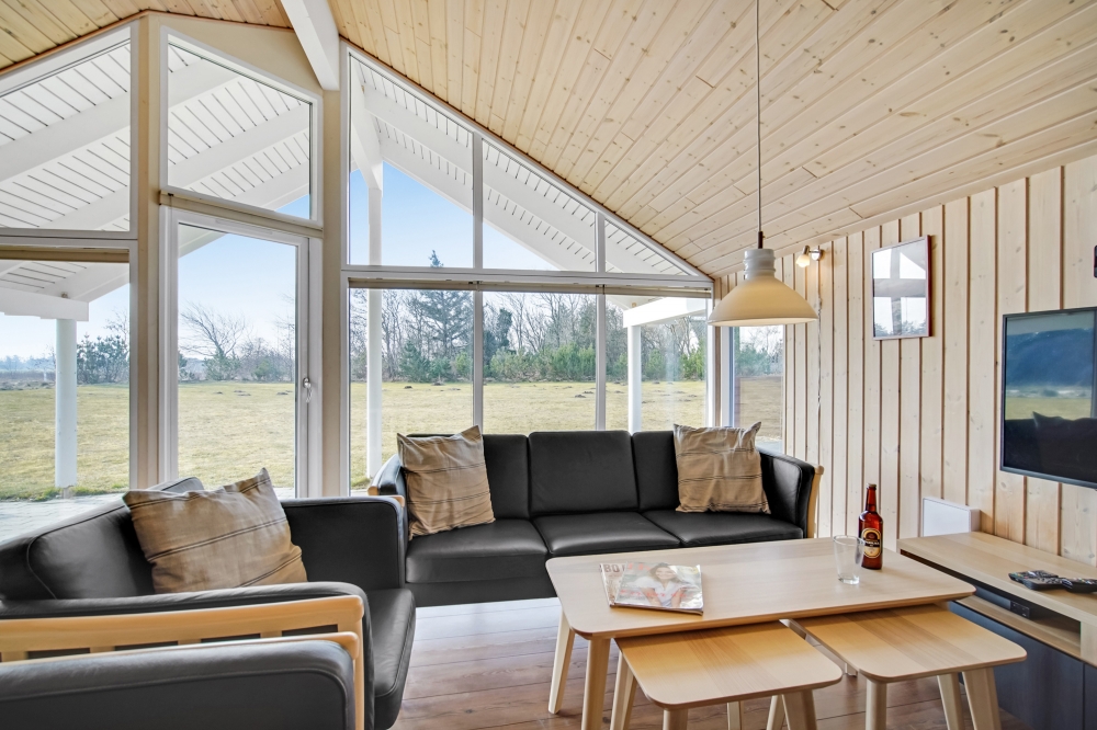 Sofakroken i luksushus nr. 236 i Nordjylland.