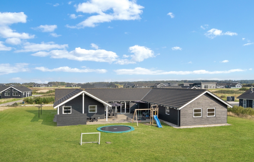 Dette lekre huset med svømmebasseng, nr. 194, med plass til 20 personer, ligger i Nordjylland
