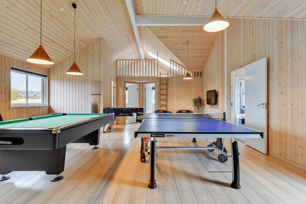 I tillegg til alle aktivitetsmulighetene i husets bassengavdeling, kan du også spille biljard, bordtennis og dart i luksushus nr. 231