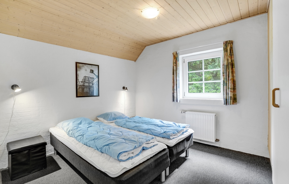 Et av de 9 soverommene i luksushus nr. 135 i Vestjylland.