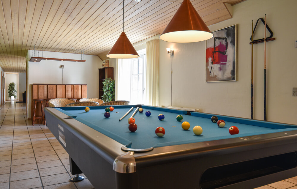 I tillegg til alle aktivitetsmulighetene i husets bassengavdeling, kan du også spille biljard, bordtennis og dart i luksushus nr. 146