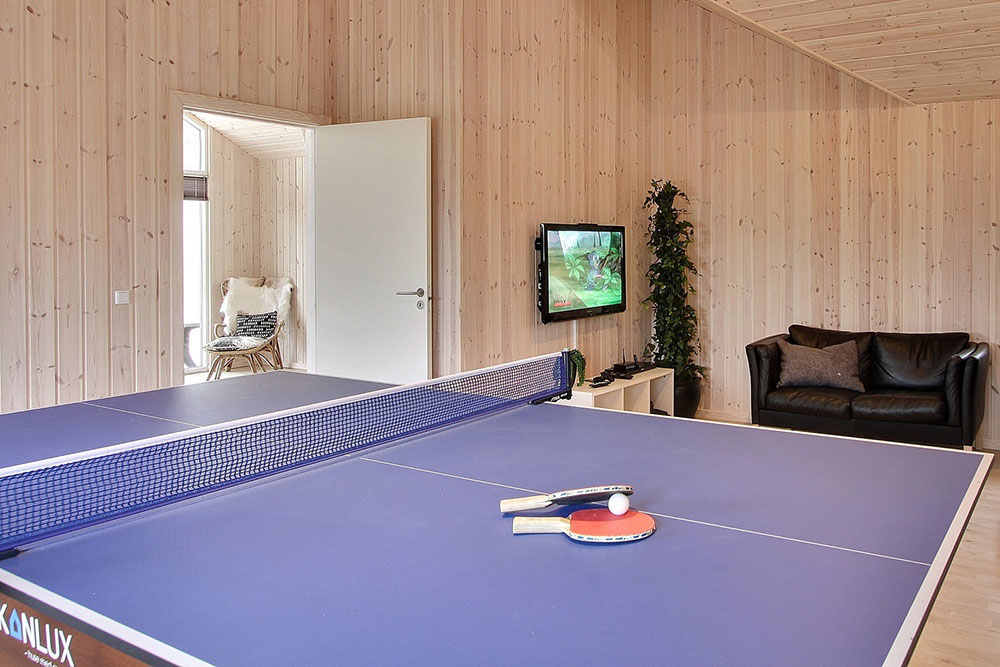 I tillegg til alle aktivitetsmulighetene i husets bassengavdeling, kan du også spille biljard, bordtennis og dart i luksushus nr. 274